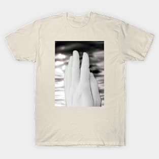 Digital collage and special processing. Hand near soft light. Soft and calm. To exist. Almost grayscale, pale. T-Shirt